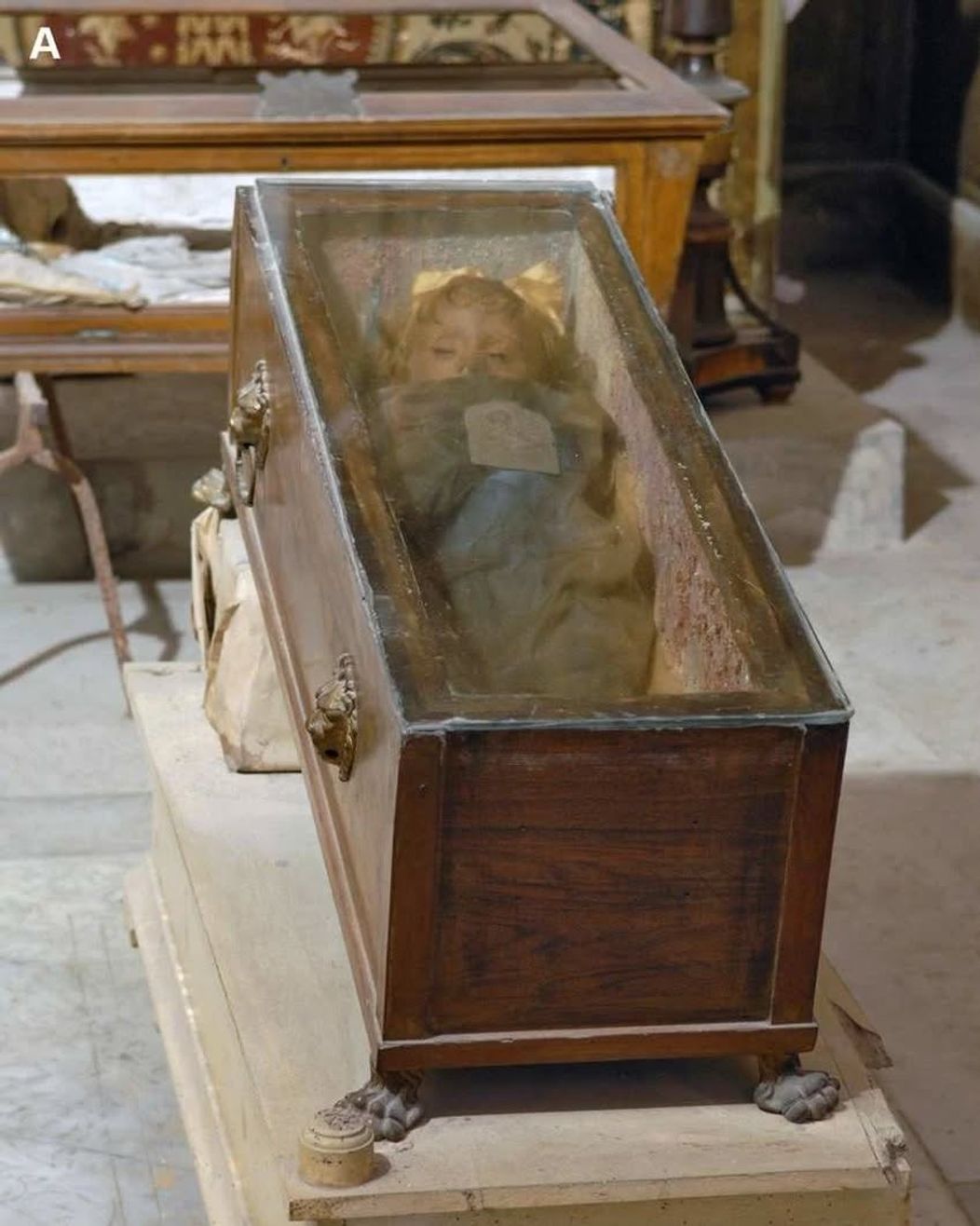 The mummy of Rosalia Lombardo .In the depths of an obscure Sicilian catacomb, there lies a young girl in an open casket. Her name is Rosalia Lombardo and she died at the tragically young age of two due t (2)