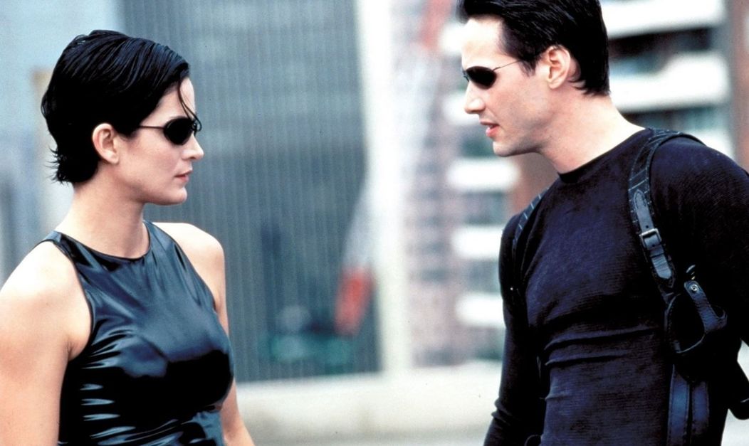 Carrie-Anne Moss și Keanu Reeves în Matrix. FOTO: wall.alphacoders.com