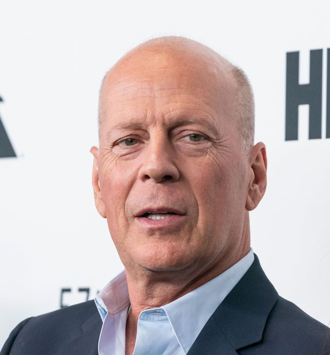 Bruce Willis fotografiat la un eveniment monden