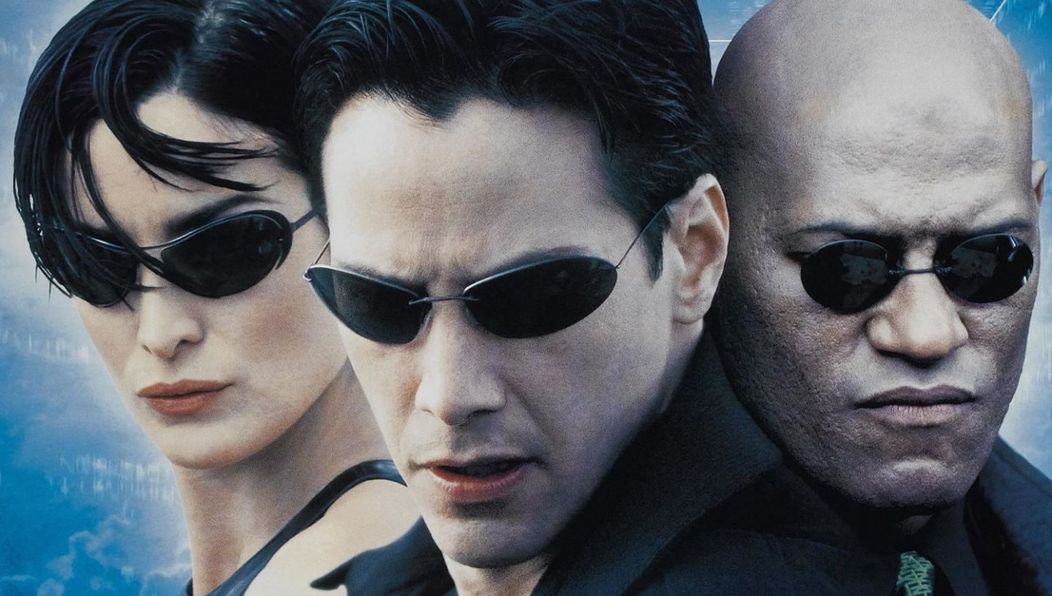 Carrie-Anne Moss și Keanu Reeves în Matrix. FOTO: wall.alphacoders.com