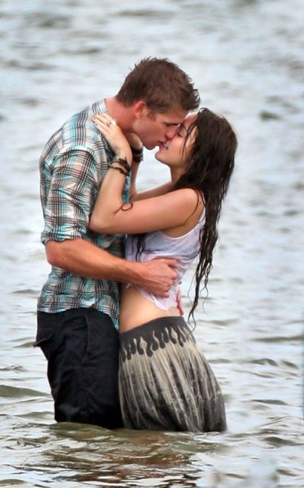 Miley Curus si Liam Hemsworth