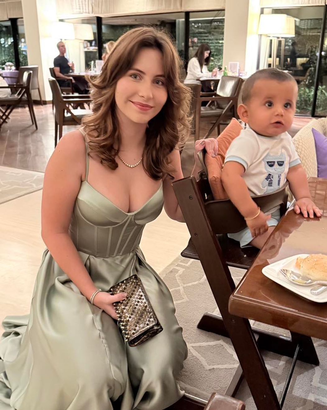 All dressed up and ready for the spotlight — Nikki’s prom night is here! And little Adi is right there, cheering for his superstar sister. A night to remember for the whole family! #NikkiAtProm #AdiTheChe (1)