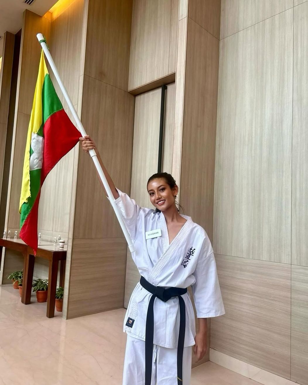 With my flag in hand and karate in my heart — proud to represent strength, discipline, and unity   #khisakhin #missworldmyanmar2025 #karate #myanmar ##missworld #72missworld #missworldintelangana #beautywitha