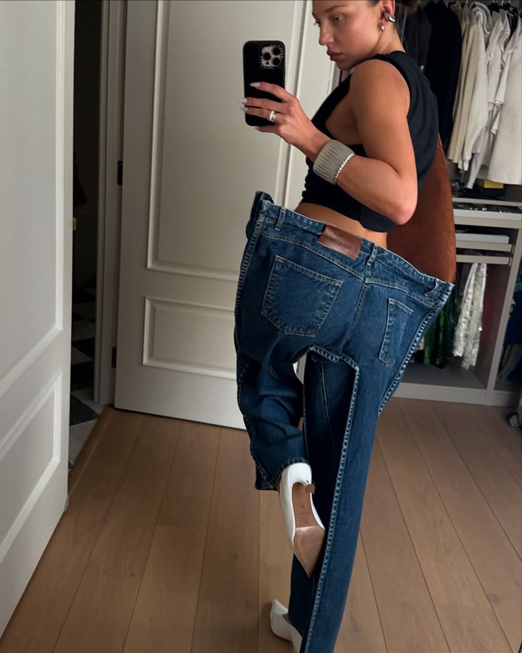 Not for everyone — and that’s the point. @maryfurtas styling our avant-garde square silhouette jeans for everyday life like a pro. ❤️_🔥🟦Jeans are now available for preorder at kseniaschnaider.com — made for