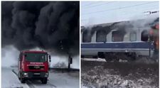 Imagini cu vagonul unui tren de călători care a luat foc pe drumul spre Deva. A fost activat planul roșu de intervenție