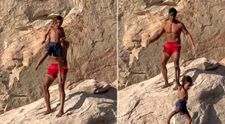 „Am încremenit când am văzut acest video”. Un tată își aruncă fiul în apă de pe o stâncă