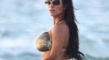 Posesoarea celui mai sexy posterior, Kim Kardashian, a luat <span style=