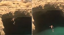 A plonjat in apa de pe o stanca de 15 metri fara sa se uite. Ce s-a intamplat imediat dupa