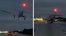 Momentul când un avion aterizează de urgență pe autostradă și lovește cu putere o mașină aflată în mers! Imaginile, surprinse pe o cameră de bord