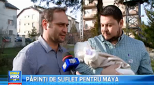 Adrian Vancica si Mihai Bobonete, nasi de botez pentru prima oara. Au crestinat-o pe fetita care s-a nascut cu pretul vietii mamei