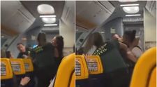 VIDEO Momentul șocant în care o celebră luptătoare MMA a bătut cu bestialitate doi polițiști care voiau să o dea jos din avion! Oamenii legii au ajuns la spital