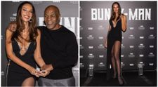 Mike Tyson, vrăjit de frumusețea Mădălinei Ghenea! Într-o rochie cu șliț adânc și decolteu amplu, actrița a fost în centrul atenției la un eveniment monden din Italia