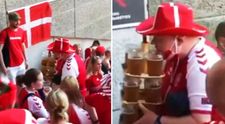 Adevăratul erou al Euro 2020! Fanul care a devenit viral după ce a cărat singur 12 beri și un cârnat