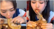 Devorează slănina ca pe castraveți. Filmuletul cu o asiatică mâncăcioasă care a șocat internetul
