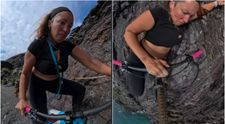 La un pas de tragedie. Momentul în care o femeie aproape a căzut în gol de pe o stâncă, în timp ce mergea cu bicicleta VIDEO