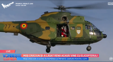 VIDEO Moș Crăciun și-a lăsat renii acasă! Vine cu elicopterul!