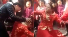O mireasa nervoasa loveste un invitat dupa ce acesta o forteaza sa stea in genunchi