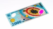 Cât a ajuns să coste o bancnotă de 2.000 de lei cu eclipsa de soare din 1999