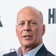 Bruce Willis fotografiat la un eveniment monden
