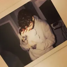 liam-payne-holds-son-bear-91747324