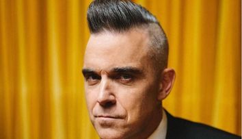 Robbie Williams s-a otrăvit cu mercur. Artistul era să moară după ce a ținut o dietă cu pește și fructe de mare