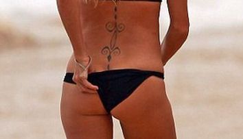 Pamela Anderson, in costum de baie la 44 de ani. <span style=