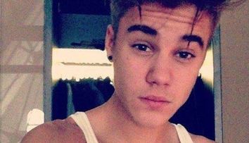 Justin Bieber, arestat pentru conducere sub influenta alcoolului si participare la cursa ilegala de masini