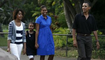 Sunt numai un zambet! Barack si Michelle Obama s-au relaxat intr-o vacanta in Caraibe