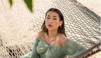 Nicole Cherry, o mămică super fit. Cum arată cântăreața în costum de baie
