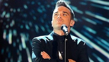 Robbie Williams, dupa ce si-a facut transplant de par: 