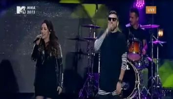 Andra, prima aparitie publica dupa nasterea micutei Eva. Cum arata artista intr-o rochie scurta