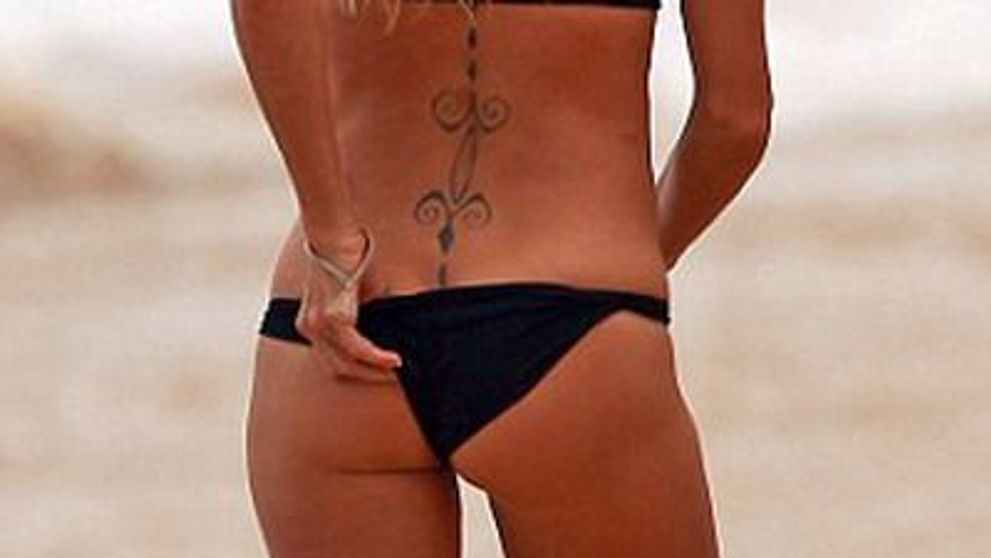 Pamela Anderson, in costum de baie la 44 de ani. <span style=