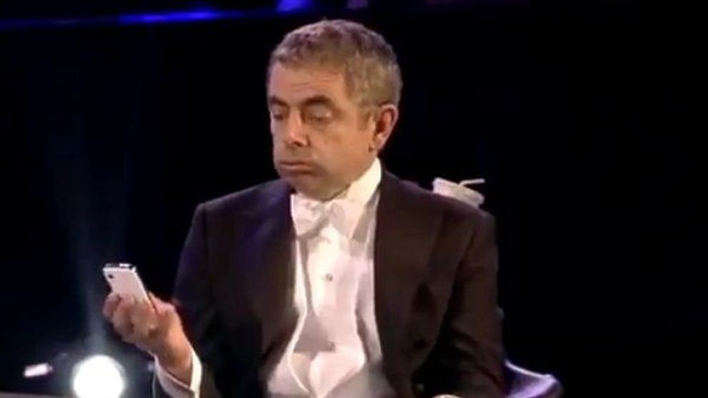 CEL MAI AMUZANT moment din deschiderea JO 2012. Mr. Bean canta cu orchestra: <span style=
