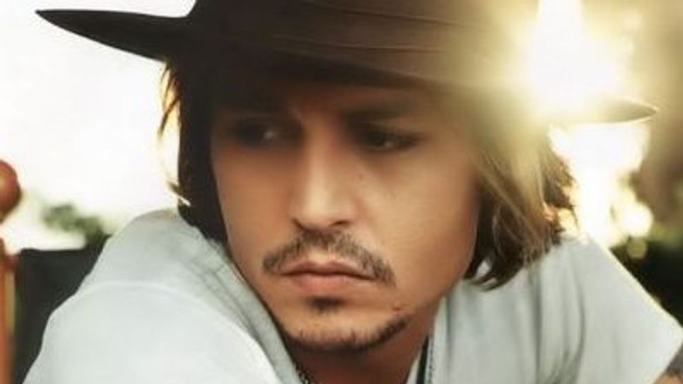 Johnny Depp si-a dat foc la fata in copilarie
