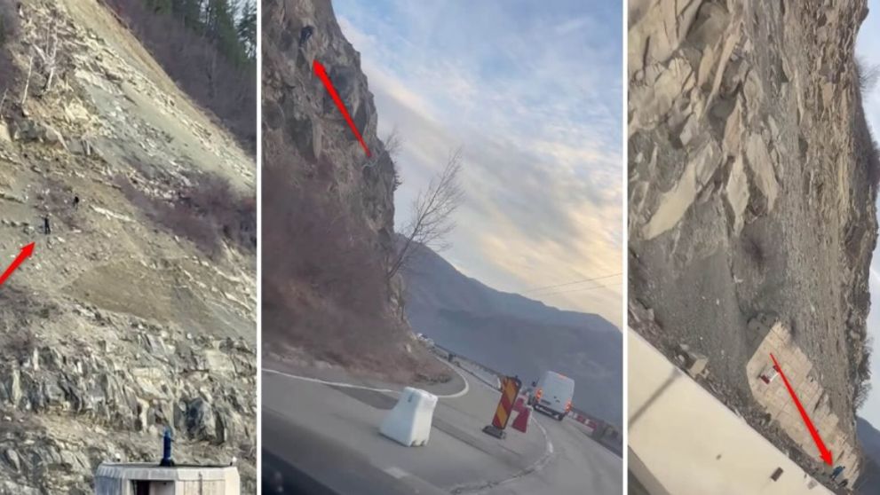 Imagini cu persoane care desprind bolovani de pe versanţi rostogolindu-i pe șosea. Viața șoferilor este pusă în pericol - VIDEO