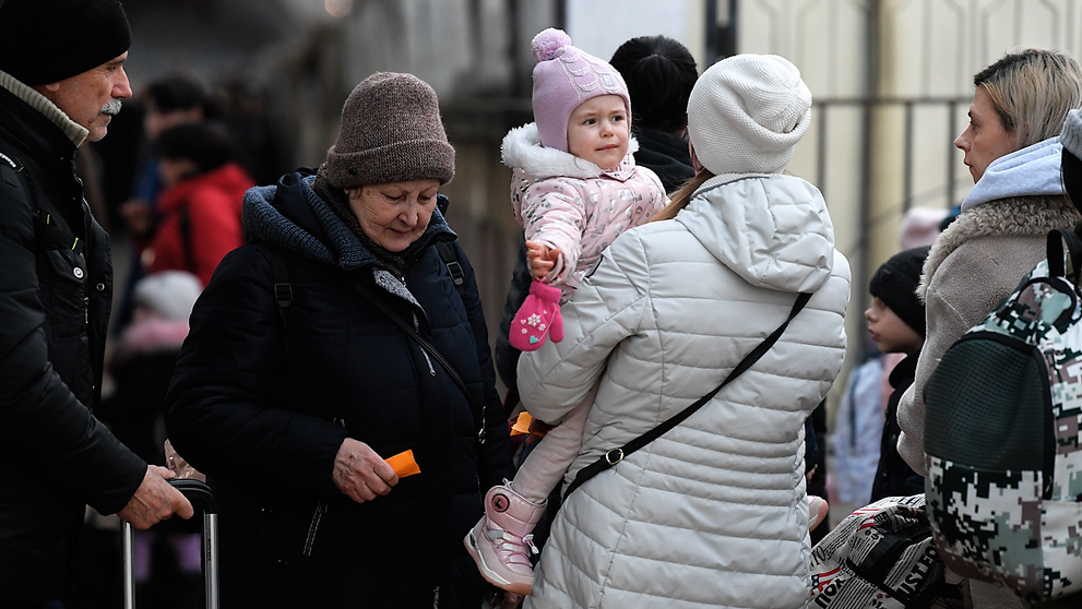 Reacția unei refugiate din Ucraina care primește bani pe stradă de la un român