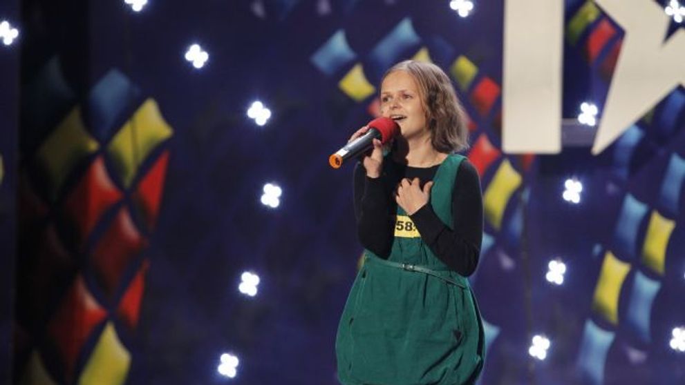 Povestea incredibila a tinerei care a ridicat toata sala in picioare la 