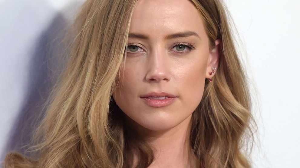 Cine e barbatul controversat cu care s-a cuplat Amber Heard dupa ce i-a frant inima lui Elon Musk