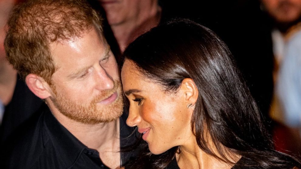 Ce i-a șoptit la ureche Meghan Markle Prințului Harry în timpul unei ceremonii! Un expert în cititul pe buze dezvăluie conversația celor doi