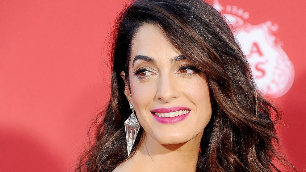 Presa mondena internationala: Amal Clooney, insarcinata a doua oara?