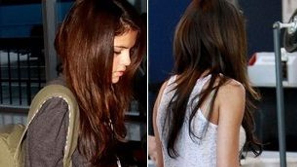Selena Gomez isi flutura noile extensii de par prin aeroport! FOTO