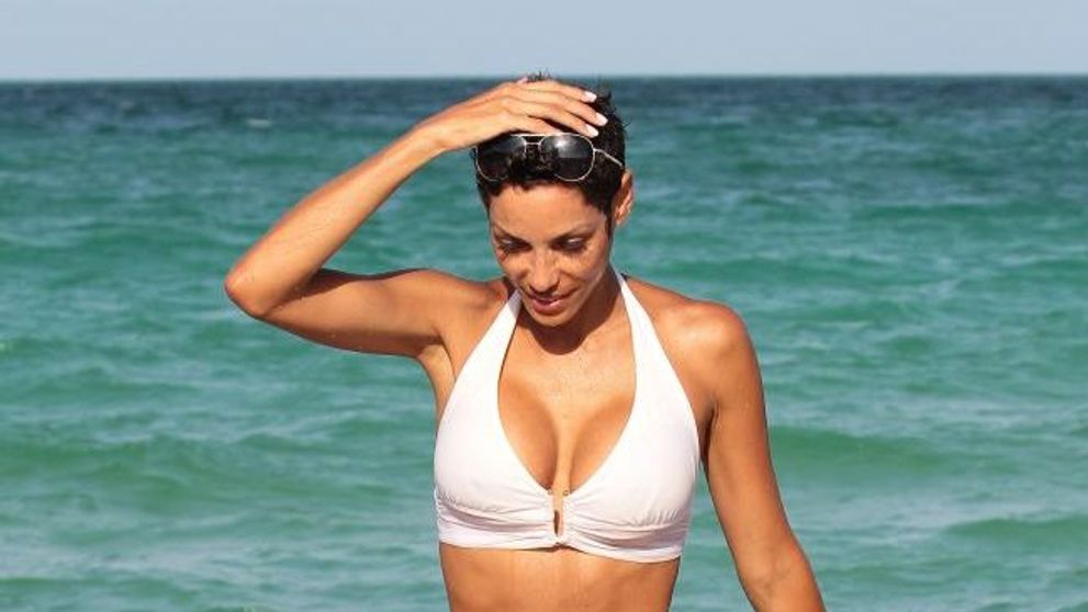 Fosta sotie a lui Eddie Murphy arata fabulos la 45 de ani. Greu de crezut ca e mama a cinci copii: FOTO
