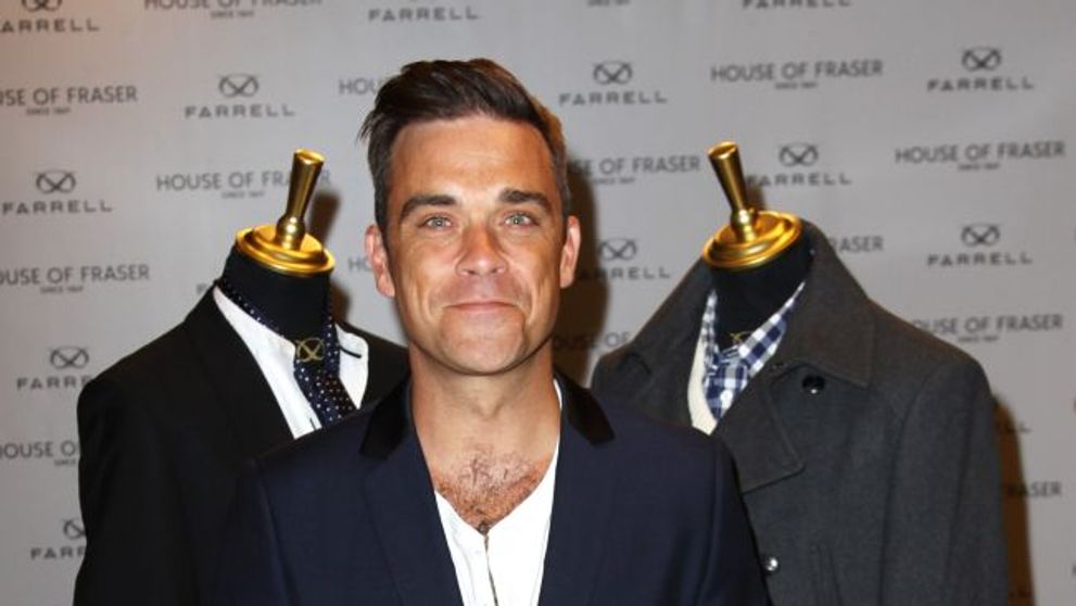 Robbie Williams va lansa un album solo anul viitor
